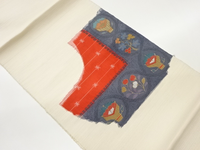 手織り紬丸文に草花・抽象模様織出し名古屋帯